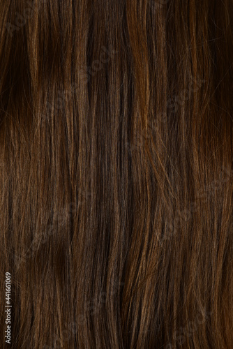 Hair close up. Womans long hair texture background closeup.