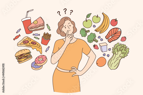 Dieting, healthy lifestyle, weight loss concept. Woman cartoon character standing choosing between healthy and unhealthy food Fastfood vs balanced menu vector illustration 