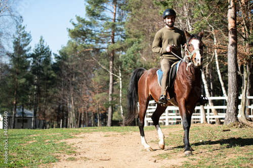 Riding Man Is Training His Horse