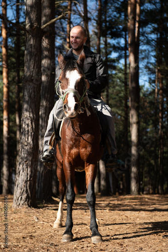 Young Man Rides a Horse © Jale Ibrak