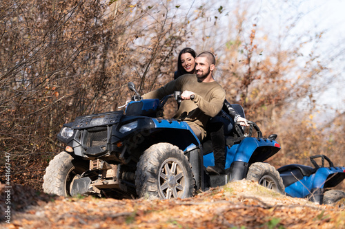 Couple Driving Off-road With Quad Bike or Atv © Jale Ibrak