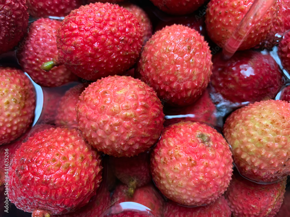 Many lychees have just been picked. Being washed at home. Many lychees have just been picked. Being washed at home.