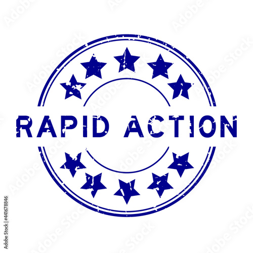 Grunge blue rapid action word with star icon round rubber seal stamp on white background