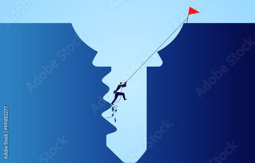 Businessman tough will climb the cliff, the key to success