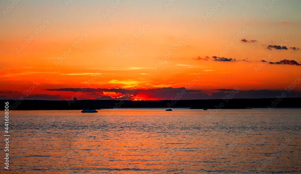 Sunset on the river, lake in artistic processing
