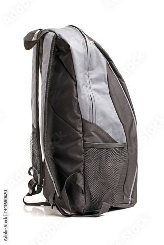 A black backpack on a white background 