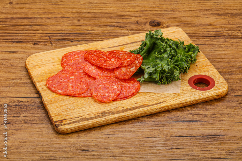 Italian spycy pepperoni sausage slices Italian spycy pepperoni sausage slices