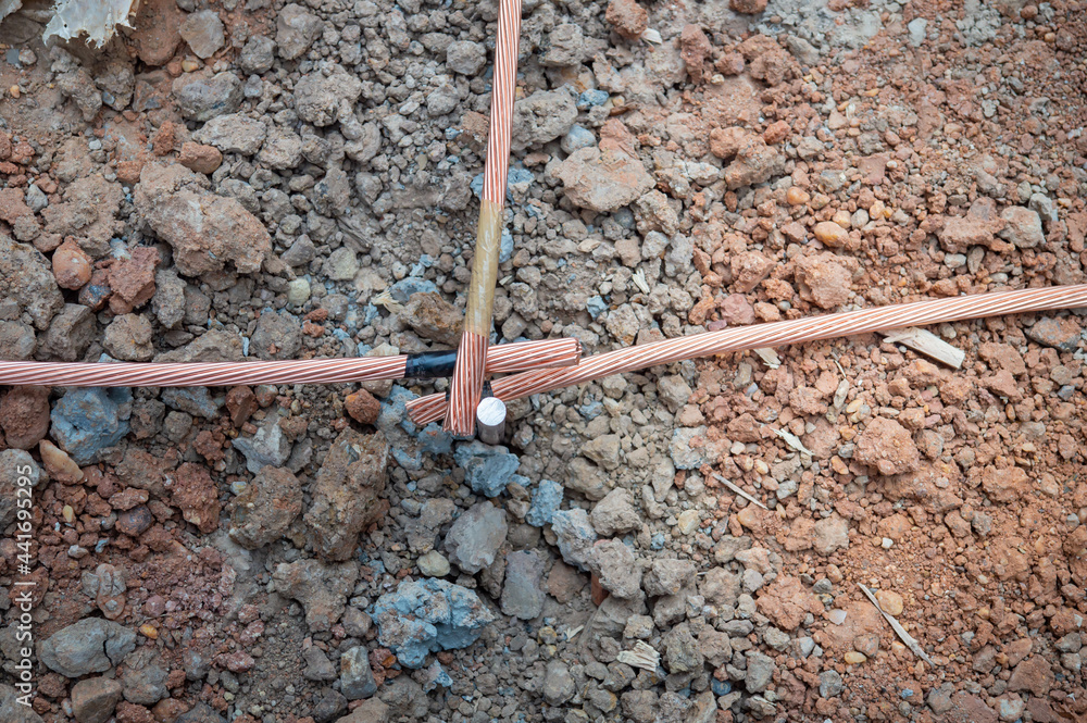 Welding copper ground wire on ground rod.Welding copper ground wire