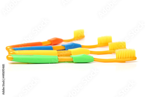 colorful toothbrushes on white background