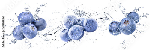 Fresh Blueberries with water splash on isolated white background
