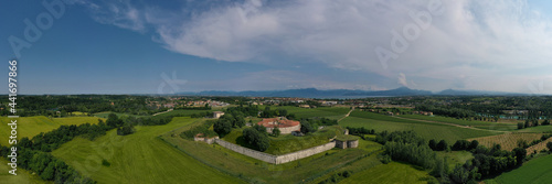 Fort Forte Ardietti on an elevated position overlooking Lake Garda, Italy. Austrian fort on the Italian territory of Peschiera del Garda. Panorama of a military historic fort aerial view. © Berg