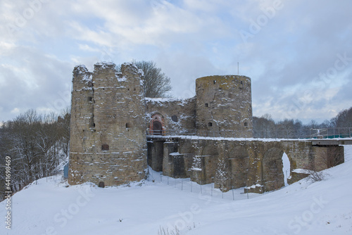 View of the ancient Koporye fortress on a cloudy February day. Leningrad region, Russia