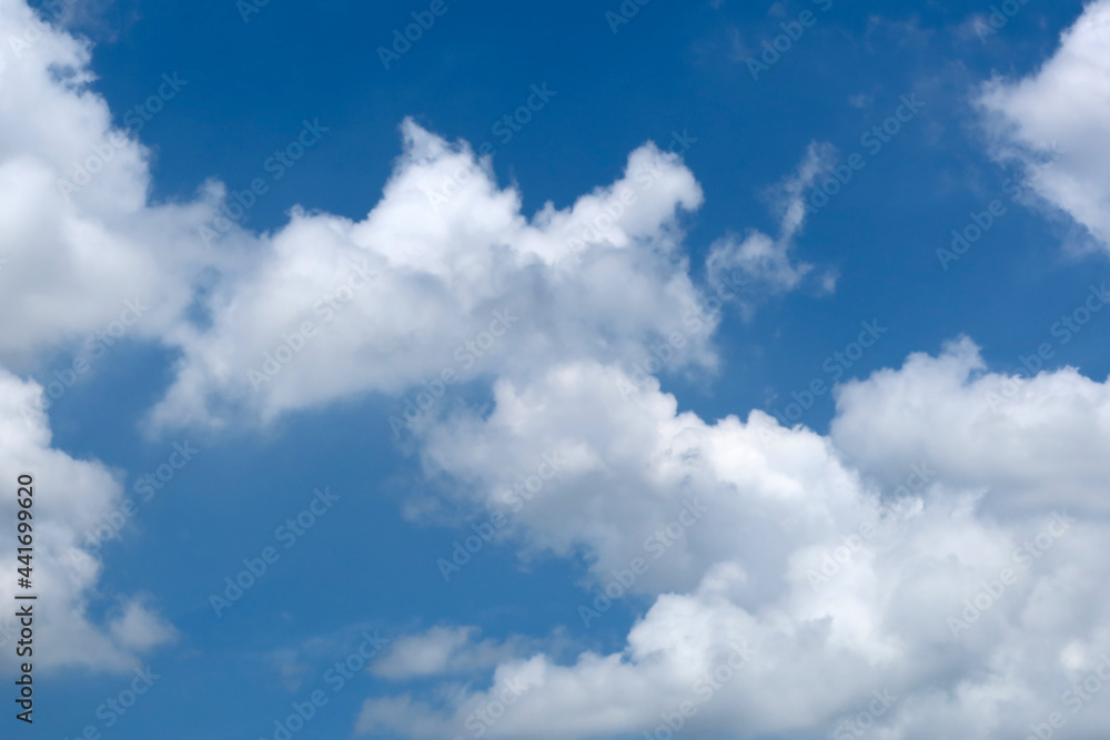 Blue sky with beautiful natural white raining clouds Blue sky with beautiful natural white raining clouds