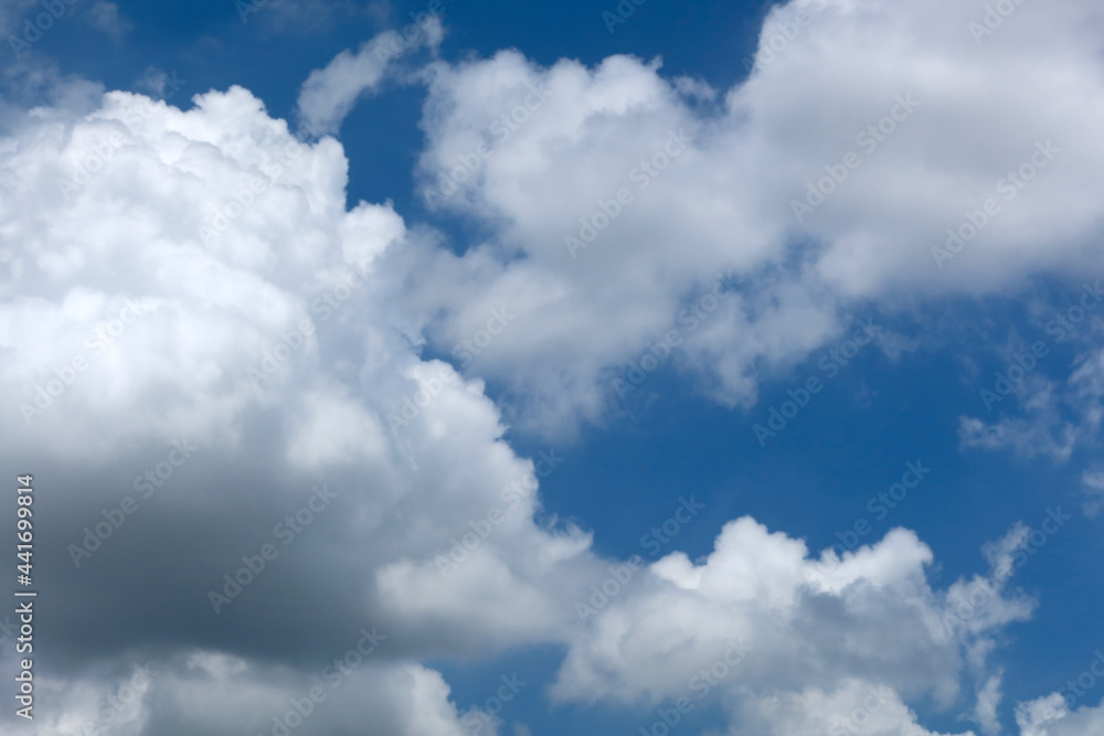 Blue sky with beautiful natural white raining clouds Blue sky with beautiful natural white raining clouds