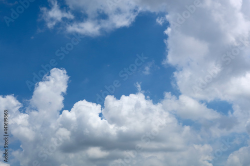 Blue sky with beautiful natural white raining clouds