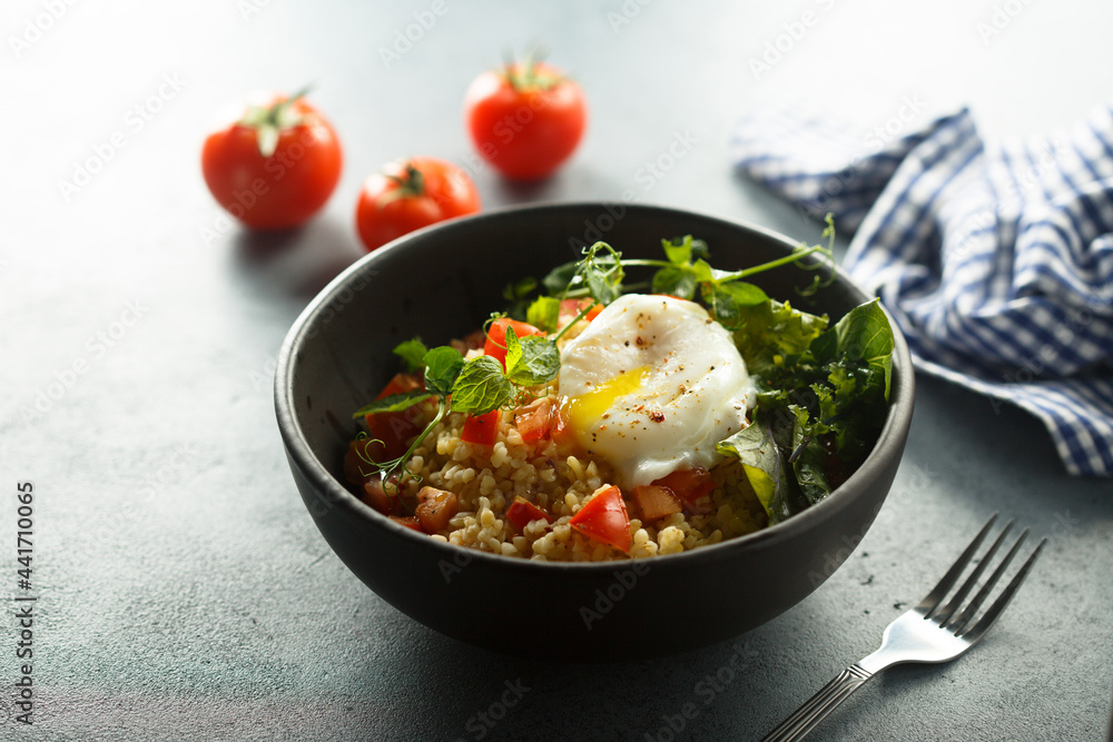 Bulgur with tomato and poached egg Bulgur with tomato and poached egg