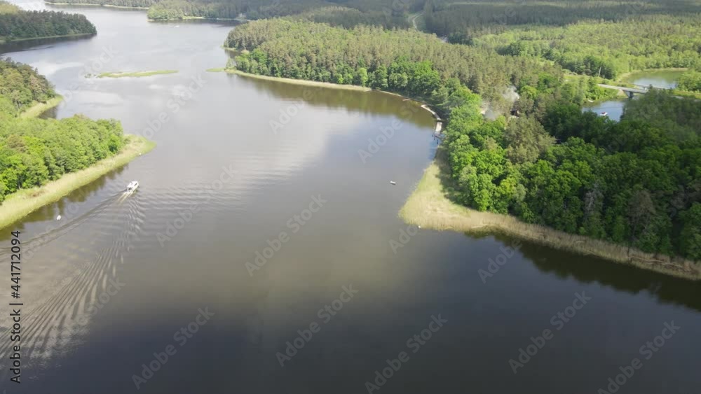 Top view of cruise ships on the Necko lake.Landscape from a drone on lakes Necko and Rospuda Top view of cruise ships on the Necko lake.Landscape from a drone on lakes Necko and Rospuda