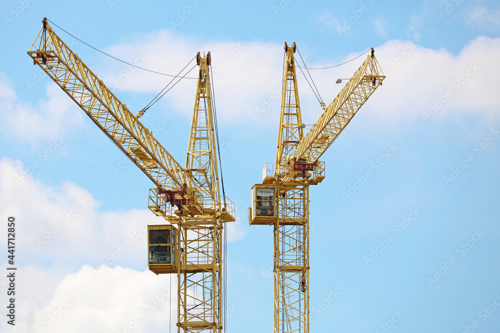 tower cranes on a construction site	