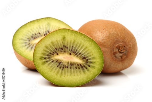 Whole and cut golden kiwifruit/ kiwi (Actinidia chinensis) on white background