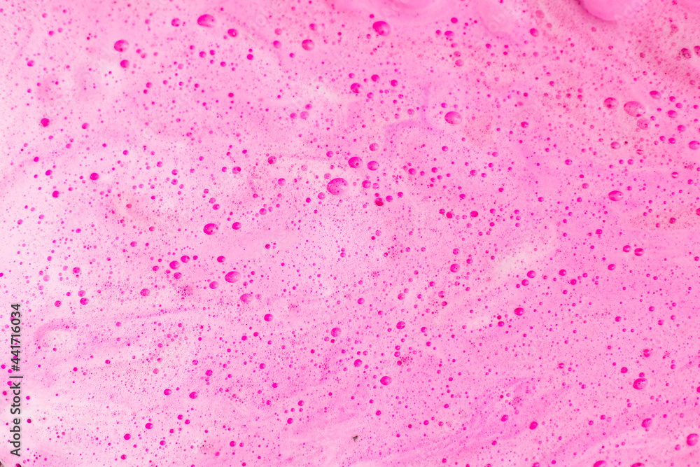 Pink soap foam, foam background texture, flat lay, top view