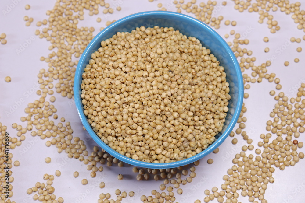 Organic jawar seeds isolated on white background Organic jawar seeds isolated on white background