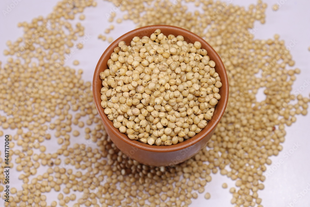 Organic jawar seeds isolated on white background Organic jawar seeds isolated on white background