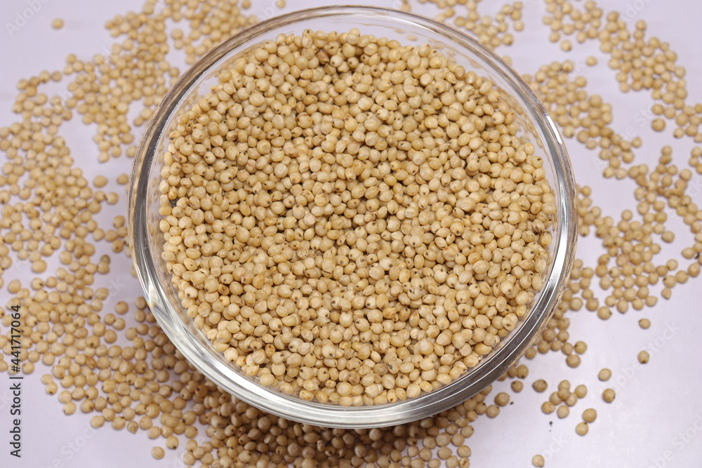 Organic jawar seeds isolated on white background Organic jawar seeds isolated on white background