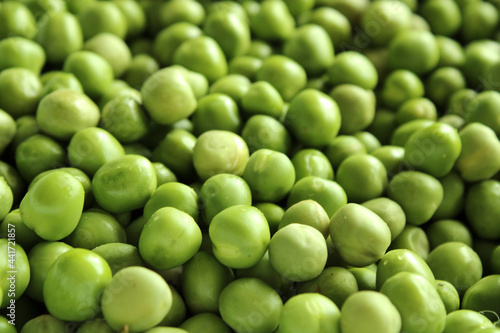 green peas background, fresh vegetables in summer