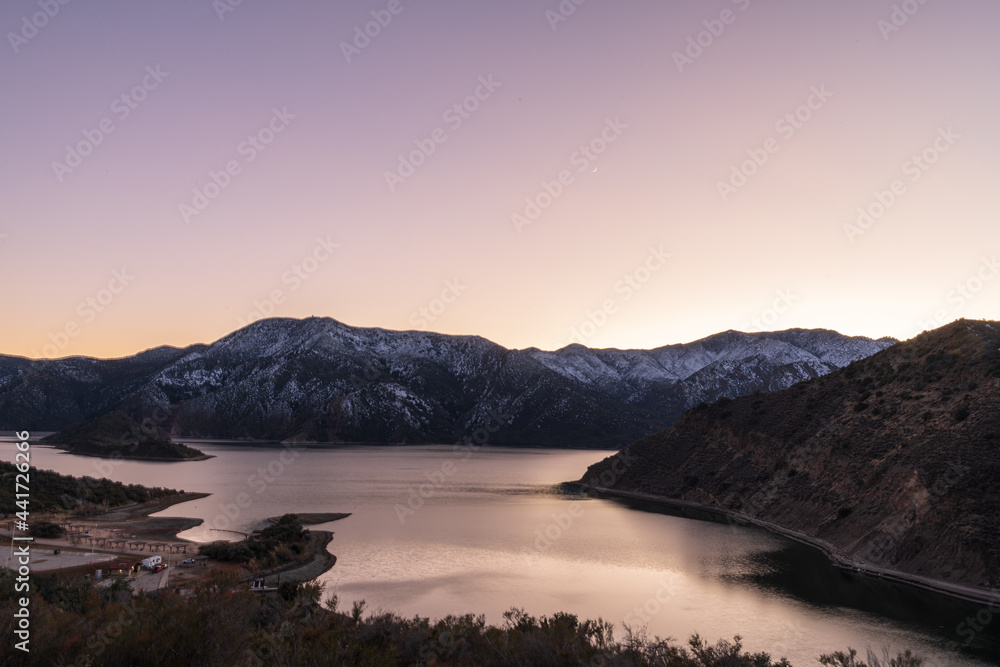 A mountain with a gentle sky and a view of the lake. A mountain with a gentle sky and a view of the lake.