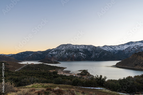 Fototapeta Naklejka Na Ścianę i Meble -  One evening, on a mountain with a view of the lake,