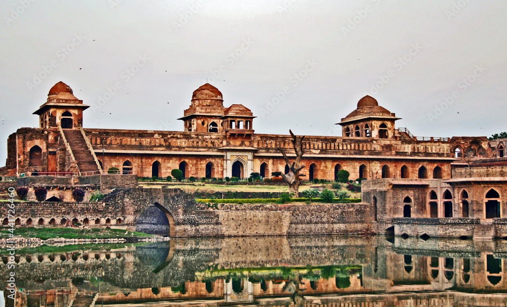 famous,Jahaz Mahal at Mandu in India with reflection in water