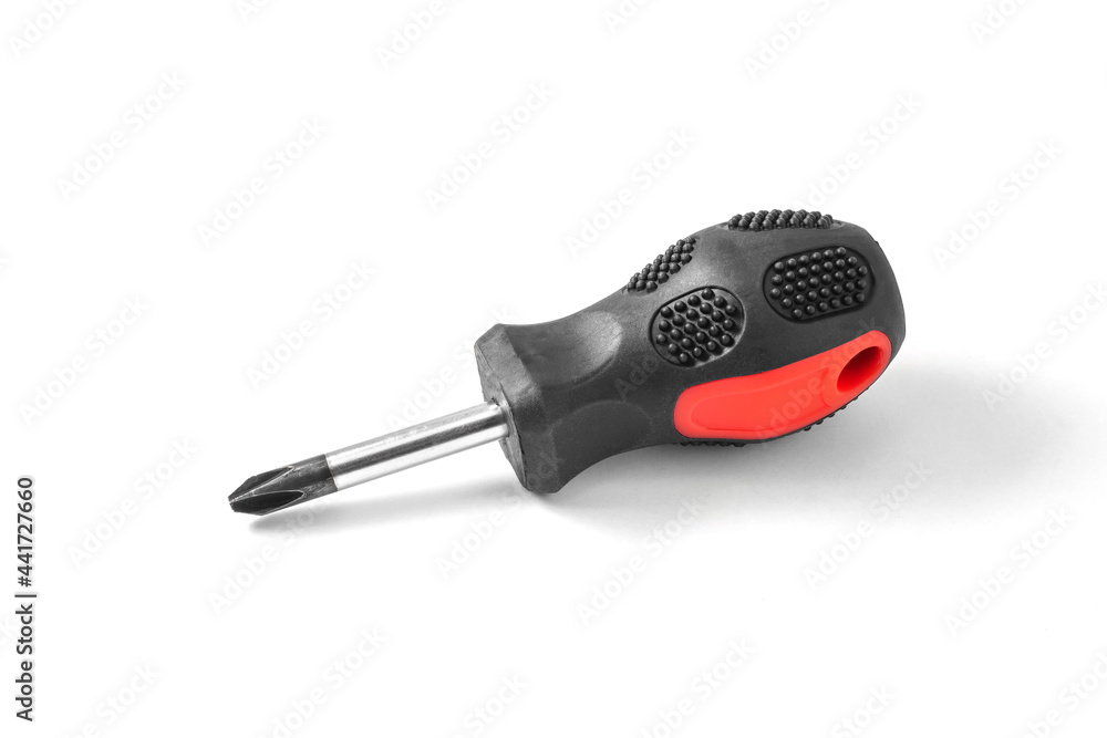Little hand screwdriver on a white background with shadow. Close-up. Little hand screwdriver on a white background with shadow. Close-up.
