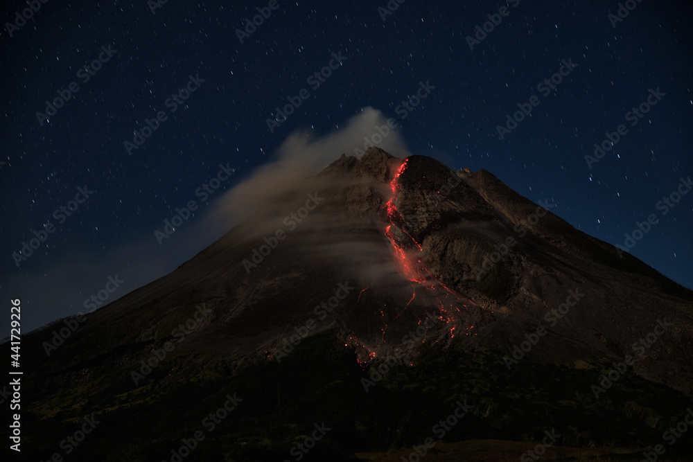 Mount Merapi erupts with high intensity at night during a full moon ...