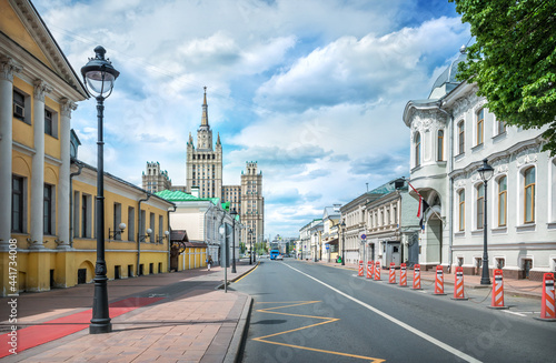 Fototapeta Naklejka Na Ścianę i Meble -  View of the skyscraper on Kudrinskaya from Bolshaya Nikitskaya street in Moscow