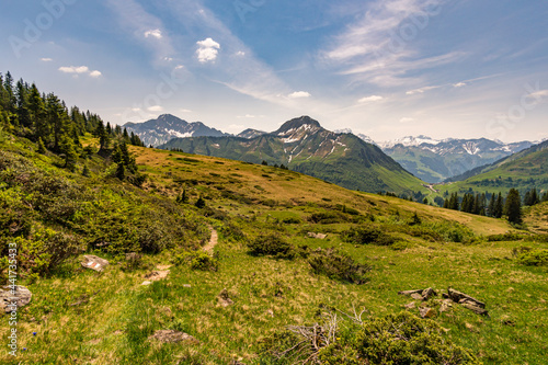 Beautiful mountain hike near Damuels along the Hochblanken ridge in Austria © mindscapephotos