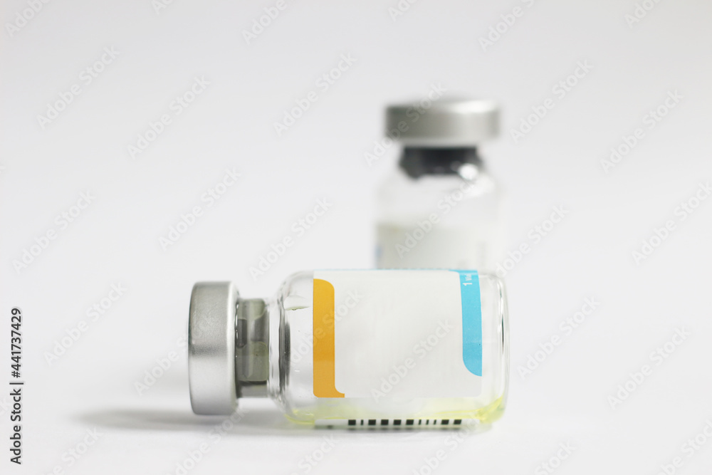 vaccine and syringe on white background with copy space for text vaccine and syringe on white background with copy space for text