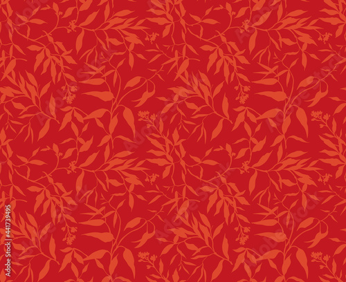 Trendy seamless vector floral pattern. Print made of red orange leaves and branches. Summer and spring motifs. Bright red background. Stock vector illustration.