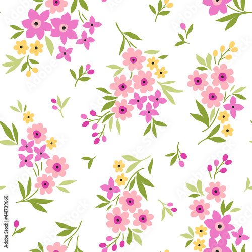 Cute floral pattern. Seamless vector pattern. Elegant template for fashion prints. Small pink and purple flowers for print. White background. Stock vector.