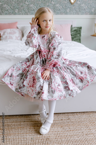little girl in a pink dress