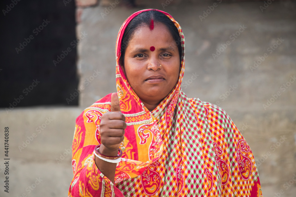 Indian Rural Woman showing thumbs up sign Stock Photo Adobe Stock