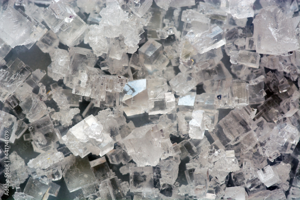 Table salt Isometric, cubic transparent crystals growth from a