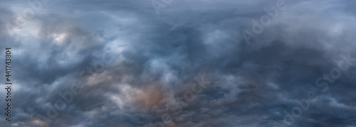 Russia. The South of Western Siberia. Gloomy sunset clouds in the evening summer sky over the fields of Altai.