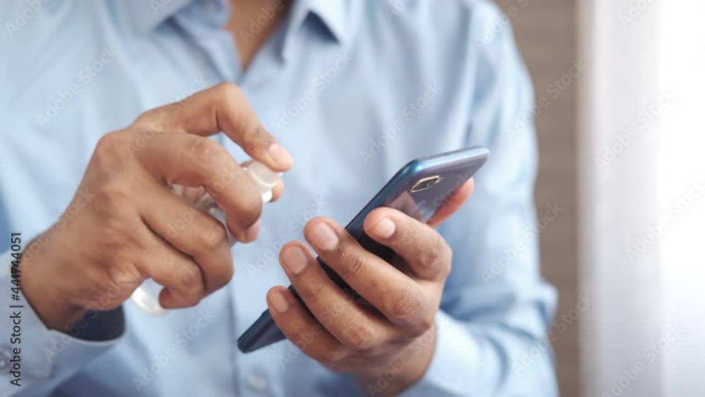 cleaning mobile phone display with sanitizer liquid cleaning mobile phone display with sanitizer liquid