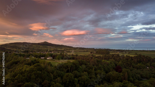 Aerial View of Carrickgollogan Mountain and Knocksink Wood with Pink Sunset