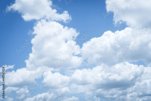 blue sky with white cloud background.