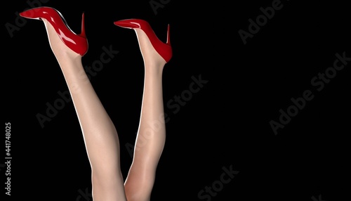 Human Long, slim legs in high heels against black background