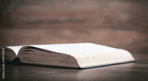 Holy Bible on the wooden table.