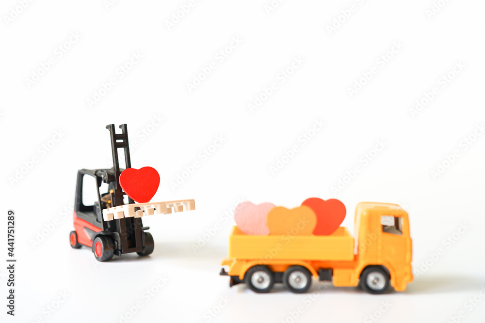 Love Concept of Red Heart Sign loading carry on Forklift Truck, Lovely Heart, A Perfect Gift or Present for Someone Special, Valentines Day background