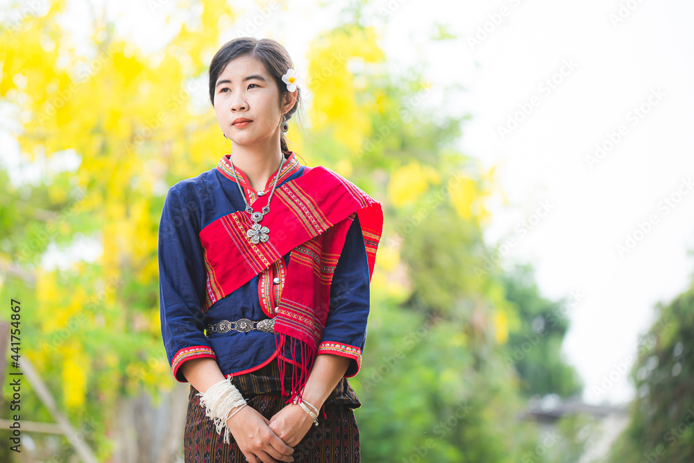 Portrait of asian girl with Thai local traditional dress, famous in countryside of Thailand,Ladies in traditional Thai costume in handmade flower baskets. Thailaind Portrait of asian girl with Thai local traditional dress, famous in countryside of Thailand,Ladies in traditional Thai costume in handmade flower baskets. Thailaind