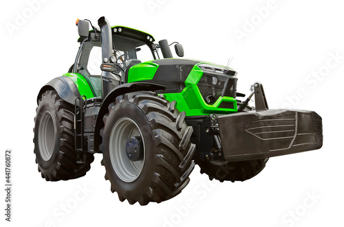 Modern green agricultural tractor isolated on a white background